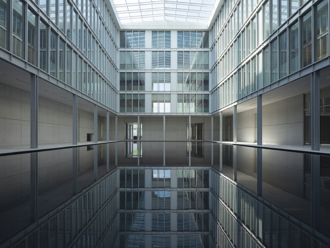 Architectural internal atrium courtyard with reflective water feature